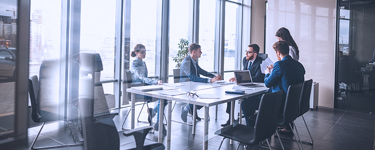 Group of business people meeting in a conference room
